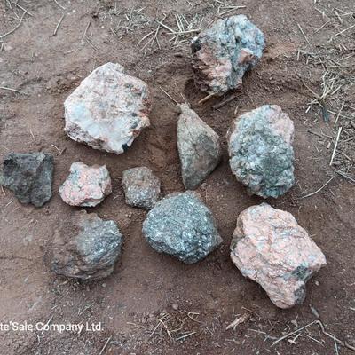 Collection of rocks some with Mica