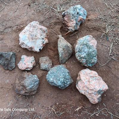 Collection of rocks some with Mica
