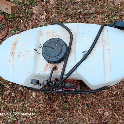Working Fimco pesticide spray tank with high flo gold series pump and wand four-wheel mount