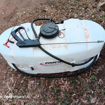 Working Fimco pesticide spray tank with high flo gold series pump and wand four-wheel mount