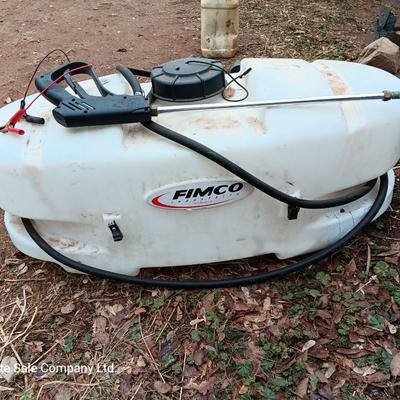 Working Fimco pesticide spray tank with high flo gold series pump and wand four-wheel mount