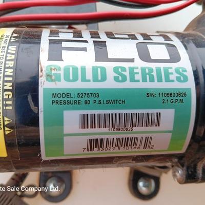 Working Fimco pesticide spray tank with high flo gold series pump and wand four-wheel mount