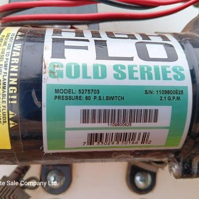 Working Fimco pesticide spray tank with high flo gold series pump and wand four-wheel mount