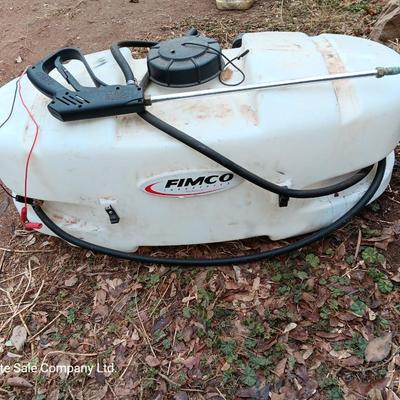 Working Fimco pesticide spray tank with high flo gold series pump and wand four-wheel mount
