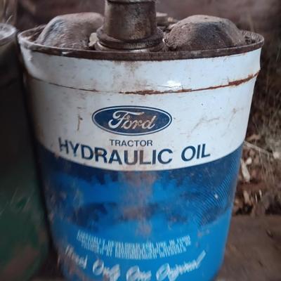 Three metal oil cans - Ford Hydraulic oil and Super motor oil