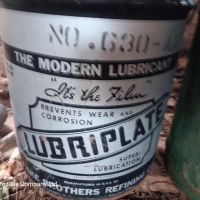Two vintage metal oil cans - and a metal bucket