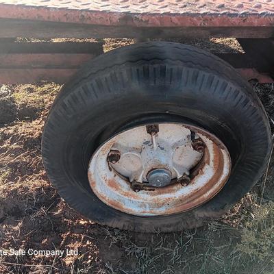 Steel framed flatbed trailer.