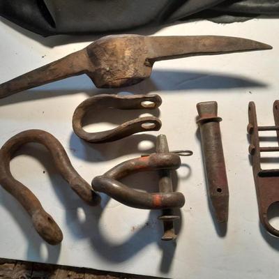 Pickaxe head, and pins and hooks