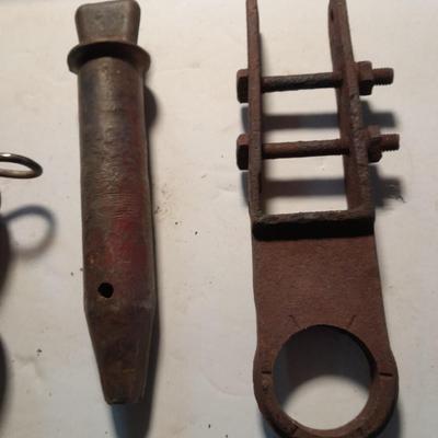 Pickaxe head, and pins and hooks