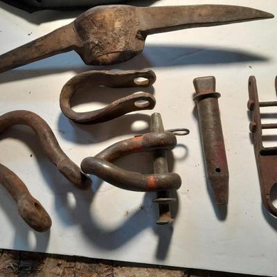 Pickaxe head, and pins and hooks