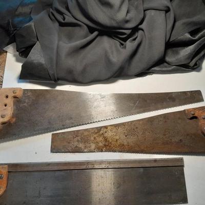 Three wooden handled handsaws