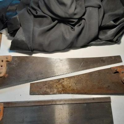 Three wooden handled handsaws