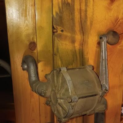 Antique rotary hand crank barrel pump