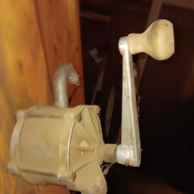 Antique rotary hand crank barrel pump