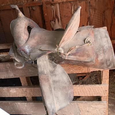 Old leather worn out saddle best for decorative use