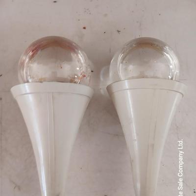 Two antique fire extinguishers