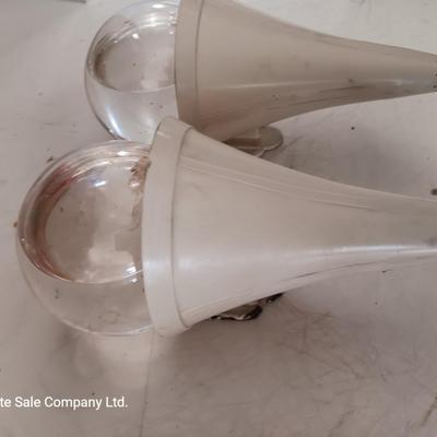 Two antique fire extinguishers
