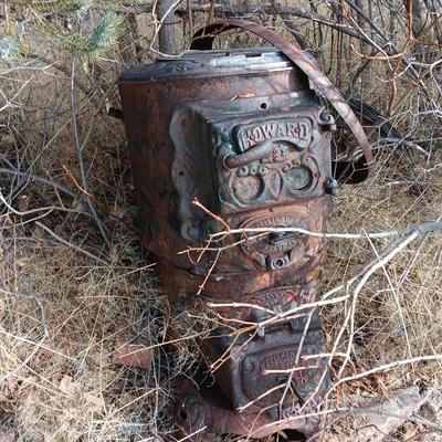 Antique Howard stove for yard art or parts