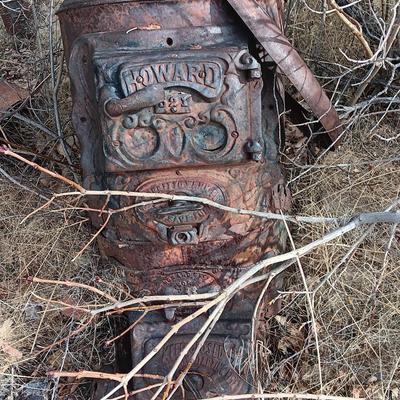 Antique Howard stove for yard art or parts