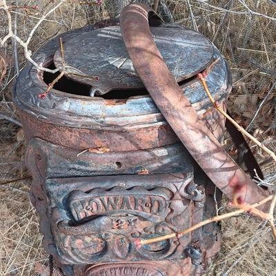 Antique Howard stove for yard art or parts