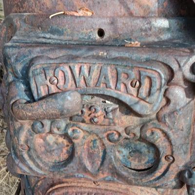 Antique Howard stove for yard art or parts