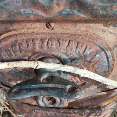 Antique Howard stove for yard art or parts
