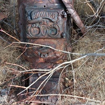 Antique Howard stove for yard art or parts
