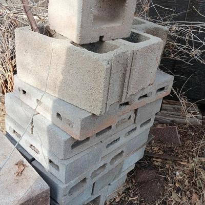 Stack of bricks standard cider blocks and smaller