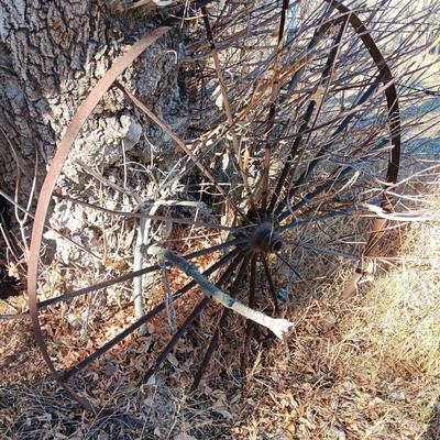Antique 54" metal wheel in good condition - yard art