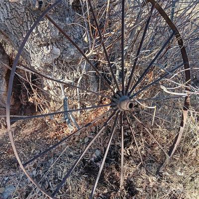 Antique 54" metal wheel in good condition - yard art