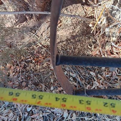 Antique 54" metal wheel in good condition - yard art