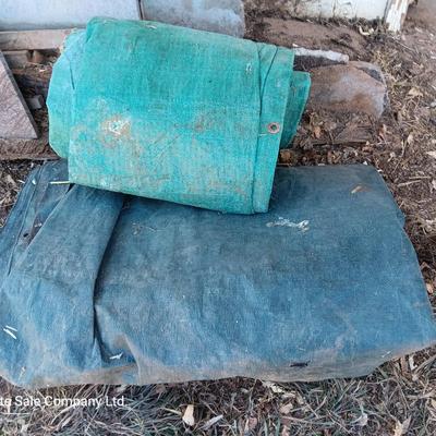 Two tarps well used, but still have life