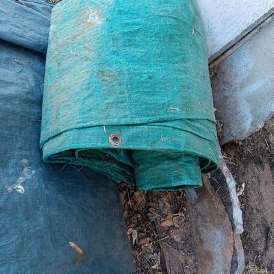 Two tarps well used, but still have life