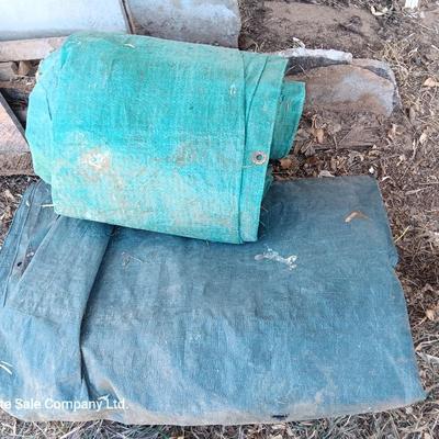 Two tarps well used, but still have life