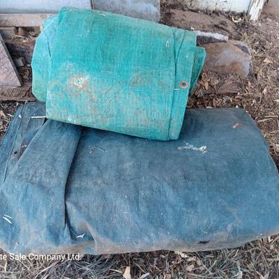 Two tarps well used, but still have life
