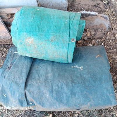 Two tarps well used, but still have life