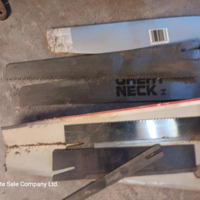 Antique cast - like Miter box with handsaw that has several blade attachments.