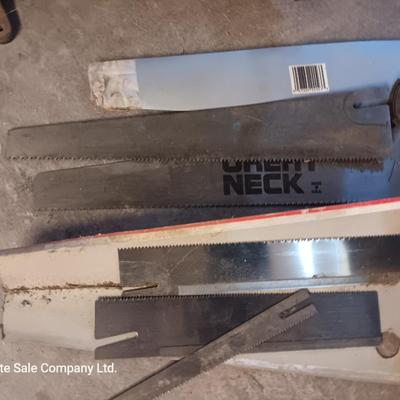 Antique cast - like Miter box with handsaw that has several blade attachments.