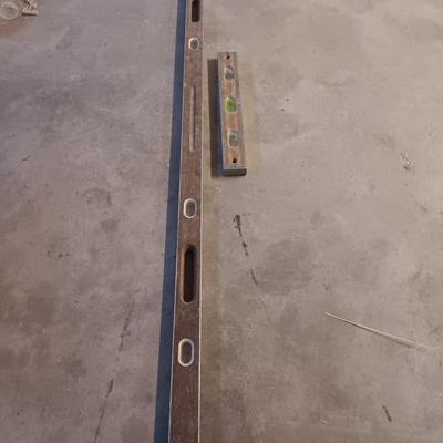 Two older wooden levels good bubbles 6-foot level and 18"