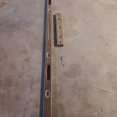 Two older wooden levels good bubbles 6-foot level and 18"