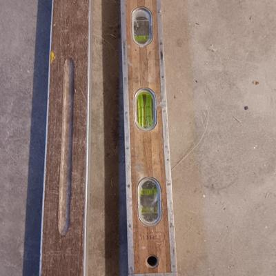 Two older wooden levels good bubbles 6-foot level and 18"