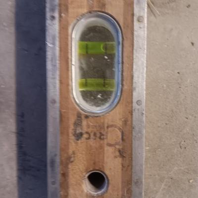 Two older wooden levels good bubbles 6-foot level and 18"