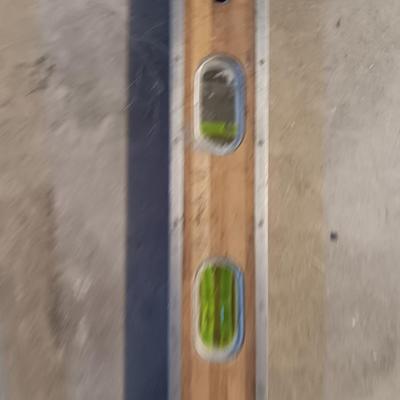 Two older wooden levels good bubbles 6-foot level and 18"