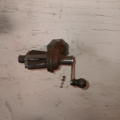 Antique can opener - hand cleaner dispenser - and pencil sharpener with a grease gun