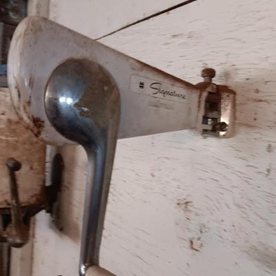 Antique can opener - hand cleaner dispenser - and pencil sharpener with a grease gun