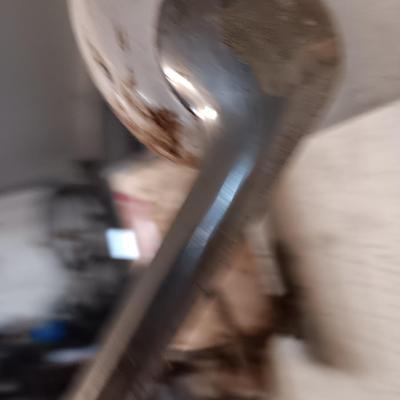 Antique can opener - hand cleaner dispenser - and pencil sharpener with a grease gun
