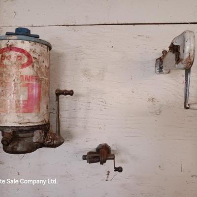 Antique can opener - hand cleaner dispenser - and pencil sharpener with a grease gun