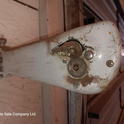 Antique can opener - hand cleaner dispenser - and pencil sharpener with a grease gun