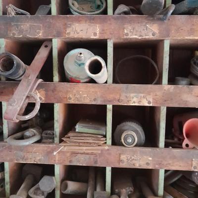 Vintage Divided wooden organizer box full of assorted hardware.