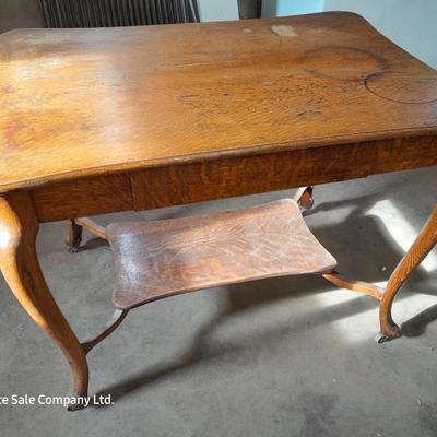 Antique two-tiered table with a drawer